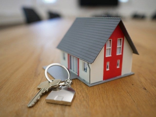 House keys and a scale model of a house